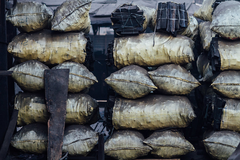 Photo by  Adam Cohn,Sacks of Charcoal, Ulingan Manila Philippines, (CC BY-NC-ND 2.0 DEED)